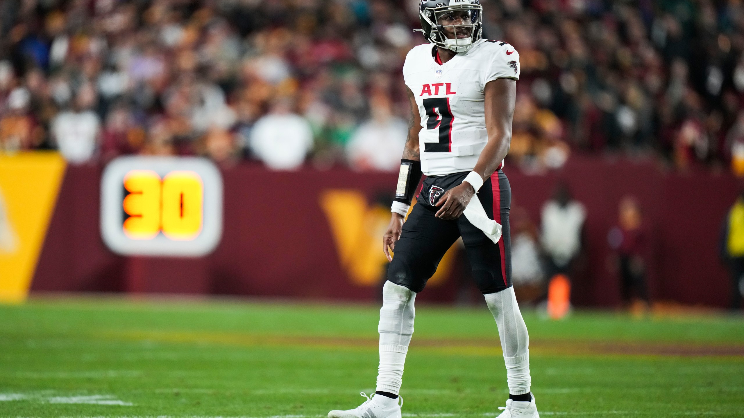 Atlanta Falcons quarterback Michael Penix Jr. (9) reacts during the second half of an NFL football game against the Washington Commanders, Sunday, Dec. 29, 2024, in Landover, Md. (AP Photo/Stephanie Scarbrough)