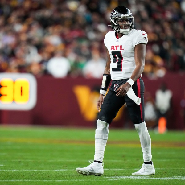 Atlanta Falcons quarterback Michael Penix Jr. (9) reacts during the second half of an NFL football game against the Washington Commanders, Sunday, Dec. 29, 2024, in Landover, Md. (AP Photo/Stephanie Scarbrough)