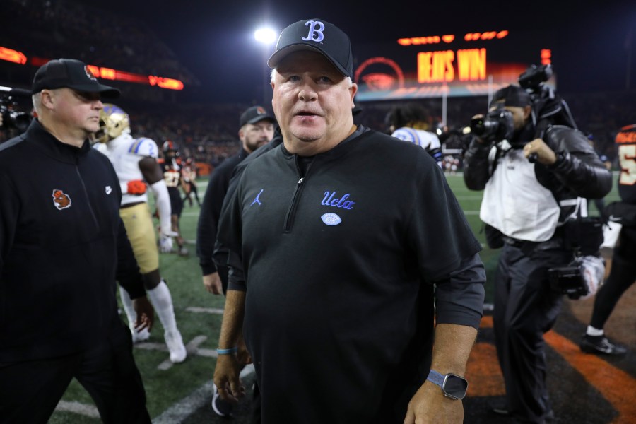 FILE - UCLA coach Chip Kelly walks off the field following the team's NCAA college football game against Oregon State, Oct. 14, 2023, in Corvallis, Ore. (AP Photo/Amanda Loman, File)