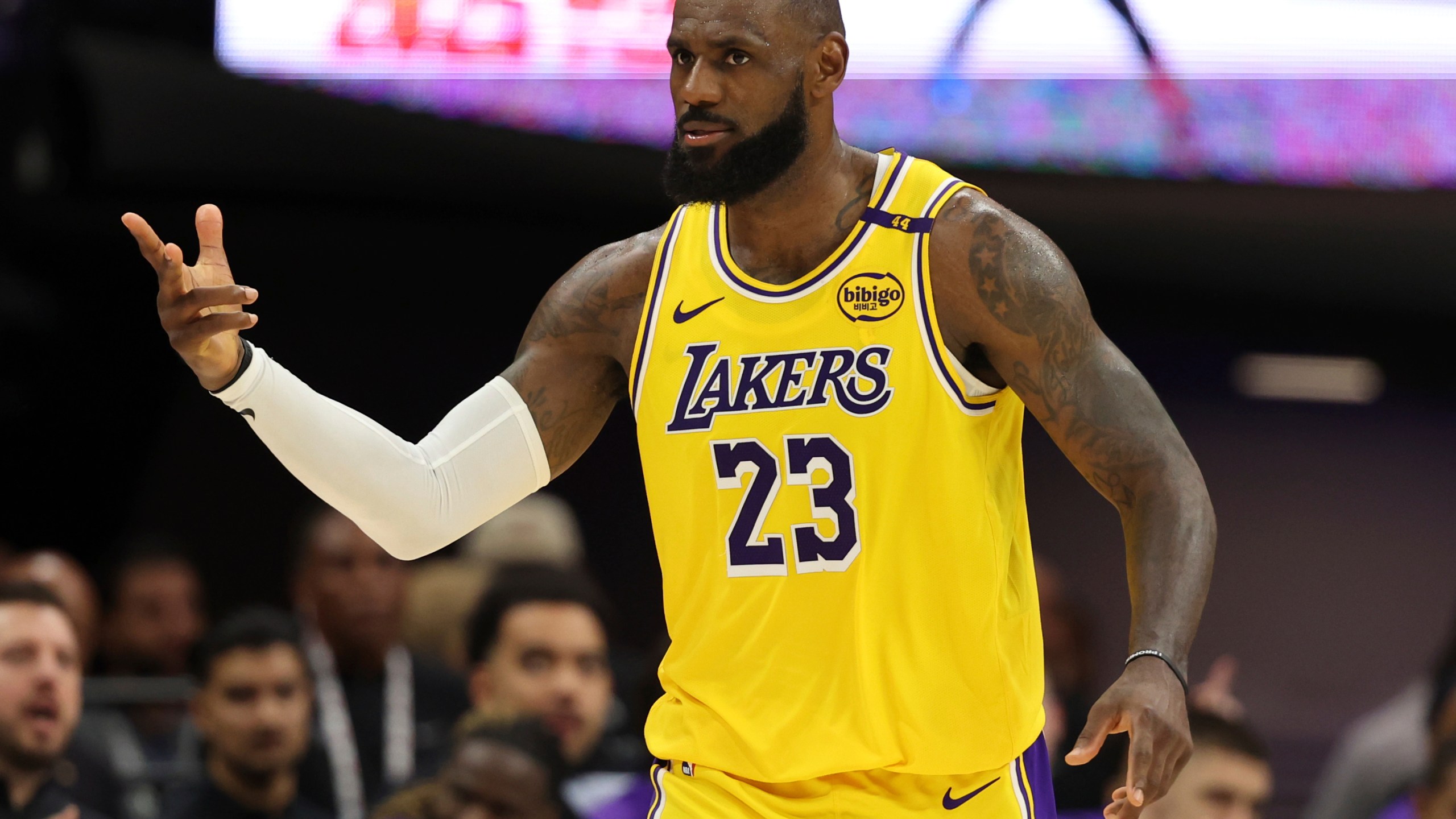 Los Angeles Lakers forward LeBron James (23) celebrates after scoring against the Sacramento Kings during the second half of an NBA basketball game in Sacramento, Calif., Thursday, Dec. 19, 2024. (AP Photo/Jed Jacobsohn)