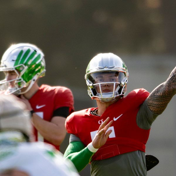 Oregon quarterback Dillon Gabriel throws during practice in Carson, Calif., Monday, Dec. 30, 2024, ahead of Wednesday's Rose Bowl College Football Playoff against Ohio State. (AP Photo/Kyusung Gong)