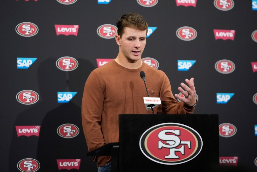 San Francisco 49ers quarterback Brock Purdy answers questions after an NFL football game against the Detroit Lions Monday, Dec. 30, 2024, in Santa Clara, Calif. (AP Photo/Godofredo A. Vásquez)