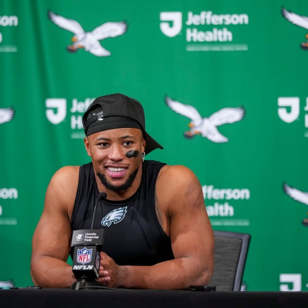 Philadelphia Eagles running back Saquon Barkley talks to reporters following an NFL football game against the Dallas Cowboys, Sunday, Dec. 29, 2024, in Philadelphia. The Eagles won 41-7. (AP Photo/Matt Slocum)