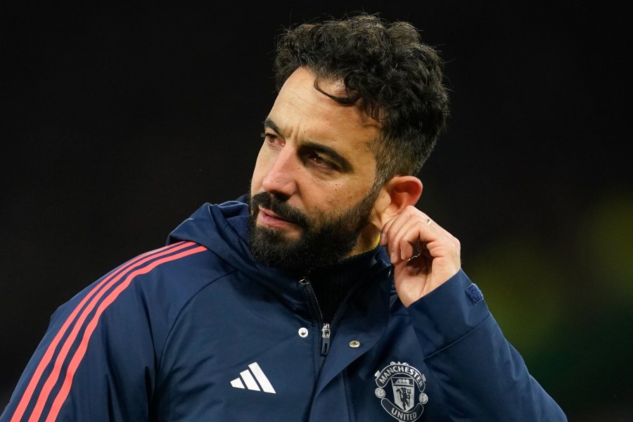 Manchester United's head coach Ruben Amorim pulls on his ear after the English Premier League soccer match between Manchester United and Bournemouth at the Old Trafford stadium in Manchester, England, Sunday, Dec. 22, 2024. (AP Photo/Dave Thompson)