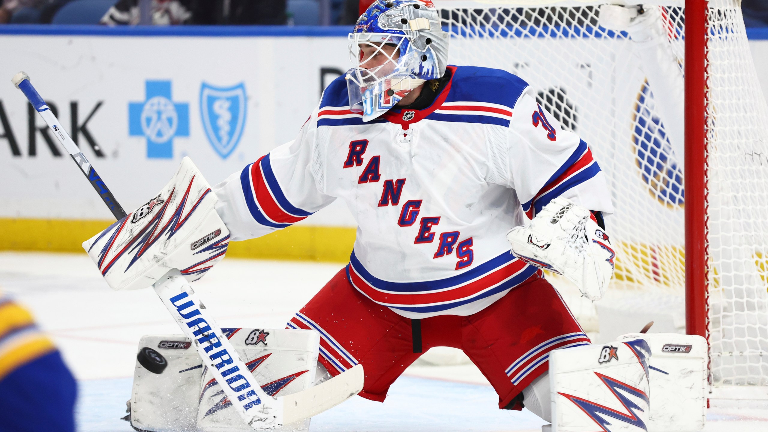 New York Rangers goaltender Igor Shesterkin (31) makes a pad save during the first period of an NHL hockey game against the Buffalo Sabres Wednesday, Dec. 11, 2024, in Buffalo, N.Y. (AP Photo/Jeffrey T. Barnes)