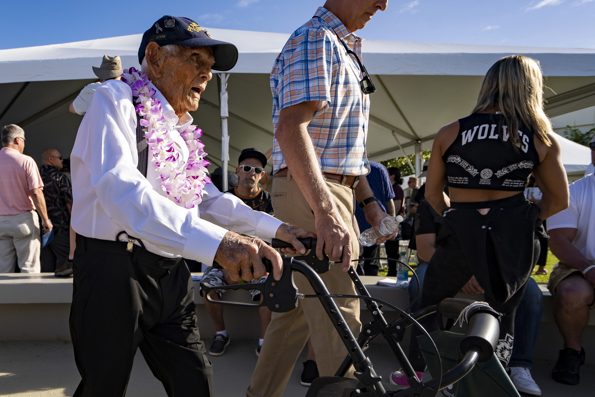 FILE - Pearl Harbor survivor Harry Chandler, 102, of Tequesta, Fla., leaves the 82nd Pearl Harbor Remembrance Day ceremony on Dec. 7, 2023, at Pearl Harbor in Honolulu. (AP Photo/Mengshin Lin, File)