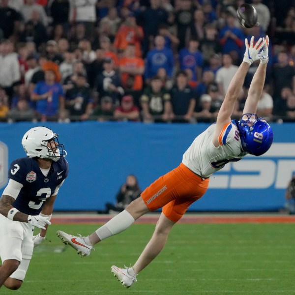 Boise State wide receiver Austin Bolt (81) can't make the catch as Penn State cornerback Jalen Kimber (3) defends during the first half of the Fiesta Bowl NCAA college football CFP quarterfinal game, Tuesday, Dec. 31, 2024, in Glendale, Ariz. (AP Photo/Rick Scuteri)