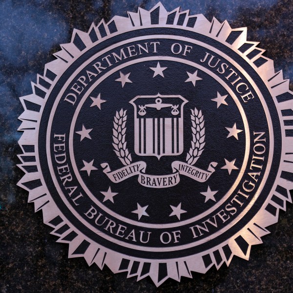 FILE - The seal of theFederal Bureau of Investigation (FBI) is seen on the Headquarters in Washington, Saturday, Dec. 7, 2024. (AP Photo/Jose Luis Magana, File)