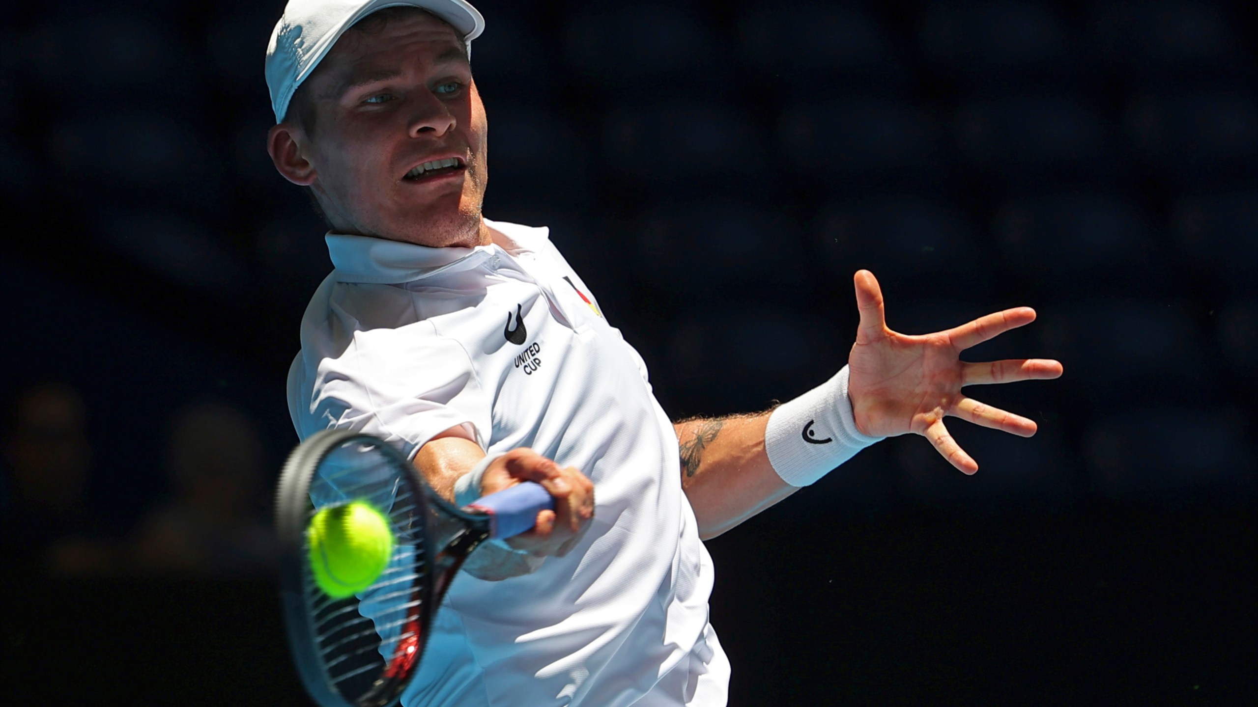 Daniel Masur of Germany hits a return shot to Alexander Shevchenko of Kazakhstan during their United Cup tennis match in Perth, Australia, Wednesday, Jan. 1, 2025. (AP Photo/Trevor Collens)