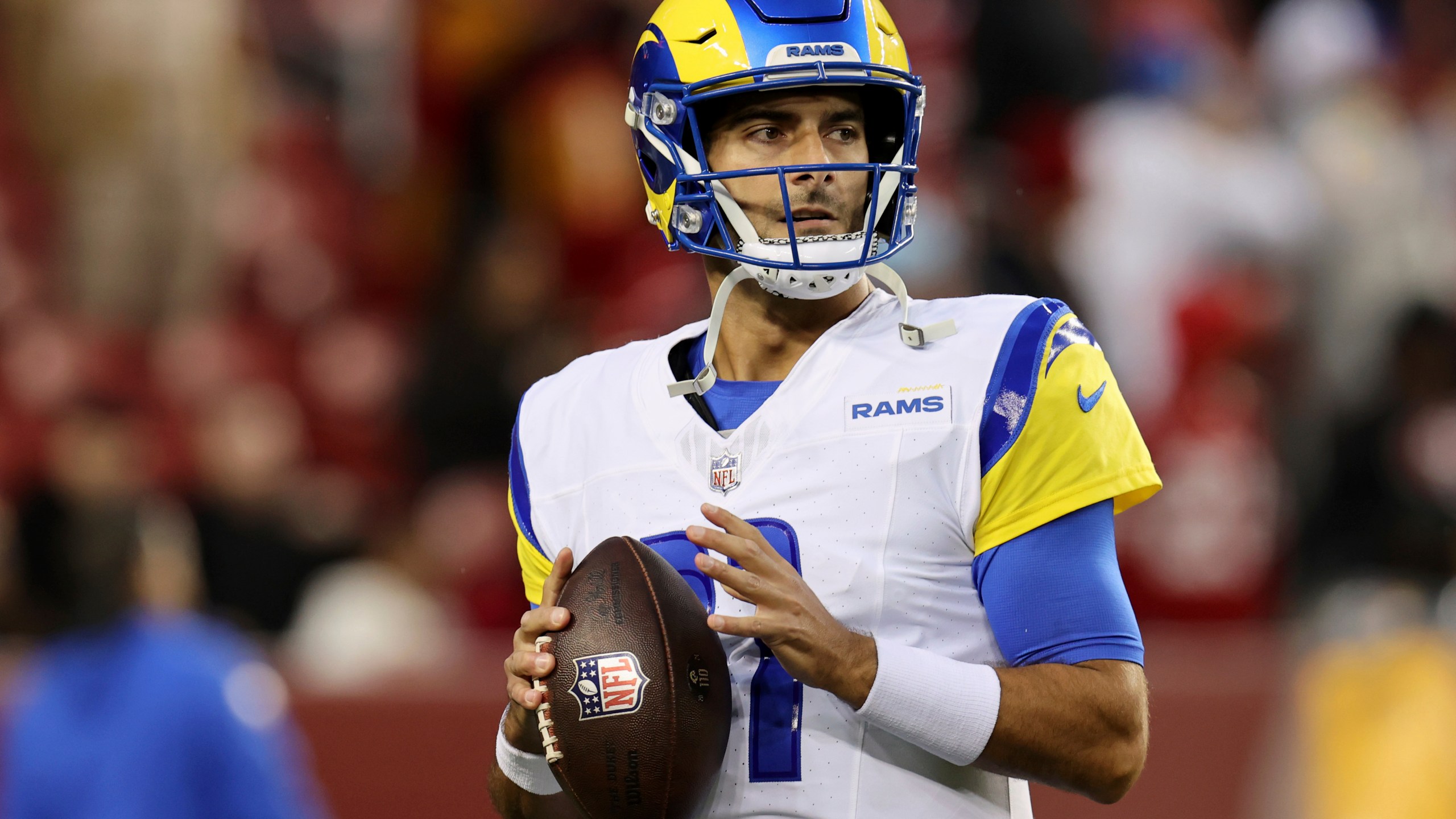 FILE - Los Angeles Rams quarterback Jimmy Garoppolo warms up during an NFL football game against the San Francisco 49ers, Dec. 12, 2024, in Santa Clara, Calif. (AP Photo/Scot Tucker, File)