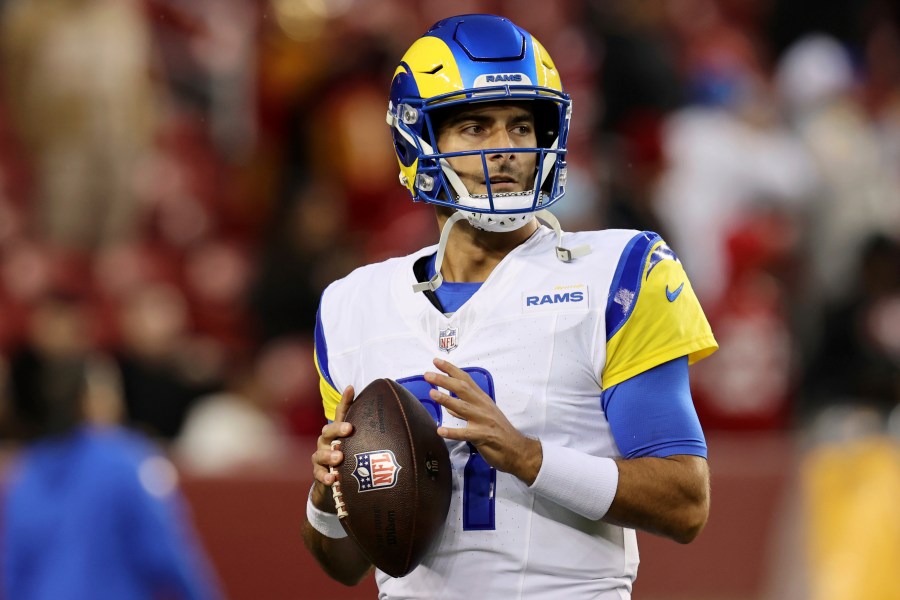 FILE - Los Angeles Rams quarterback Jimmy Garoppolo warms up during an NFL football game against the San Francisco 49ers, Dec. 12, 2024, in Santa Clara, Calif. (AP Photo/Scot Tucker, File)