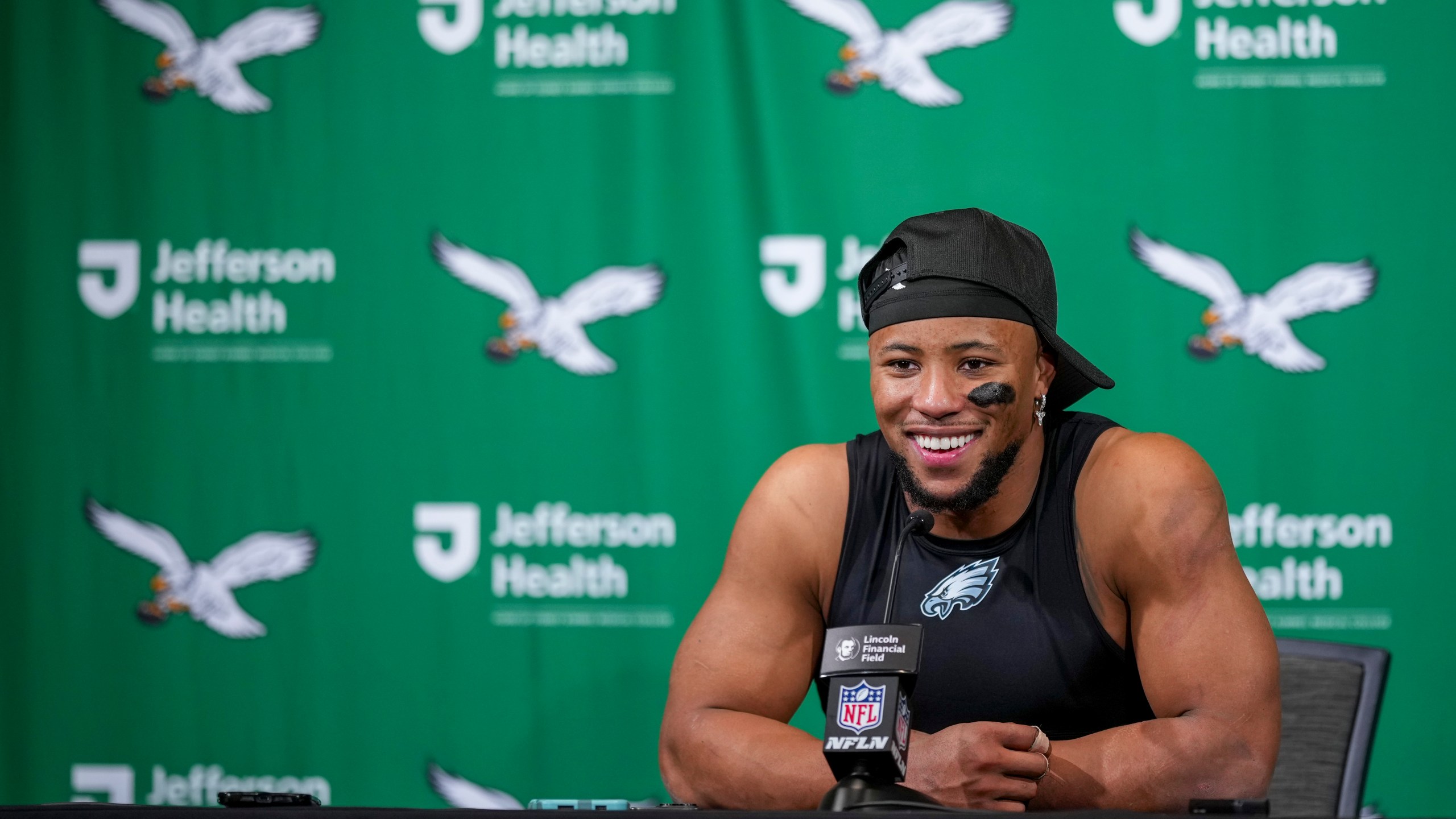 Philadelphia Eagles running back Saquon Barkley speaks to reporters following an NFL football game against the Dallas Cowboys, Sunday, Dec. 29, 2024, in Philadelphia. The Eagles won 41-7. (AP Photo/Matt Slocum)