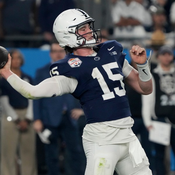 Penn State quarterback Drew Allar (15) throws against Boise State during the first half of tthe Fiesta Bowl College Football Playoff game, Tuesday, Dec. 31, 2024, in Glendale, Ariz. (AP Photo/Rick Scuteri)