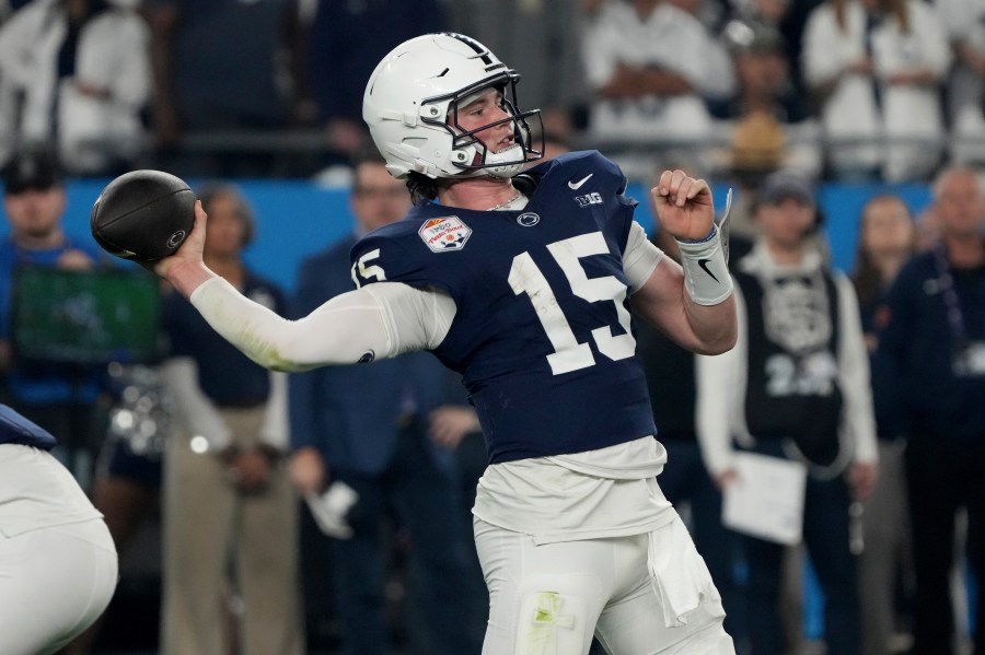 Penn State quarterback Drew Allar (15) throws against Boise State during the first half of tthe Fiesta Bowl College Football Playoff game, Tuesday, Dec. 31, 2024, in Glendale, Ariz. (AP Photo/Rick Scuteri)