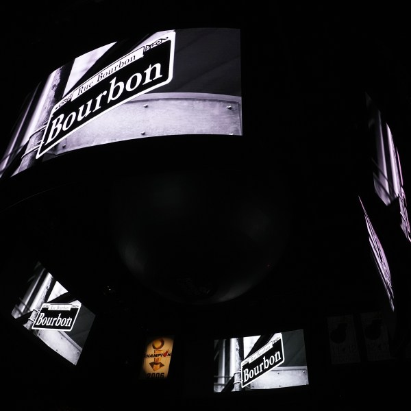 Signage for Bourbon Street is displayed on the scoreboard at the Kaseya Center as a tribute for people killed after a vehicle drove into a crowd in New Orleans before an NBA basketball game between the Miami Heat and the New Orleans Pelicans, Wednesday, Jan. 1, 2025, in Miami. (AP Photo/Lynne Sladky)