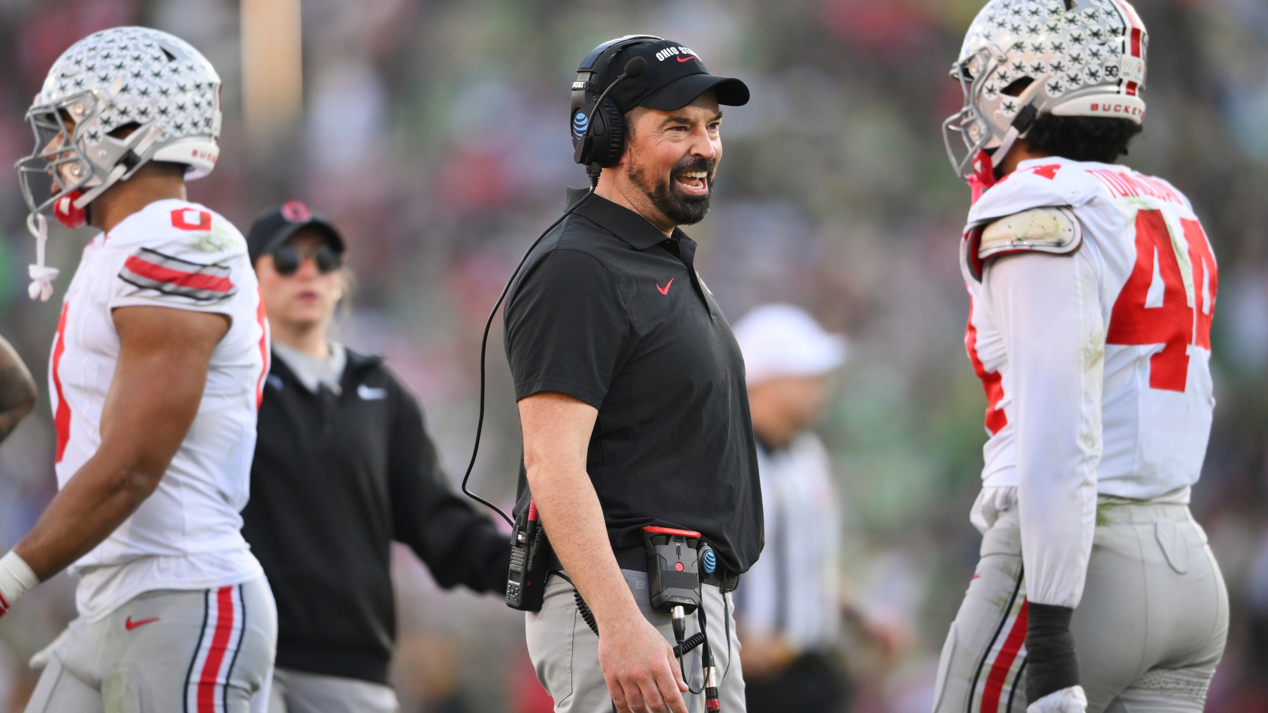 Ohio State head coach Ryan Day smiles during the first half in the quarterfinals of the Rose Bowl College Football Playoff against Oregon, Wednesday, Jan. 1, 2025, in Pasadena, Calif. (AP Photo/Kyusung Gong)