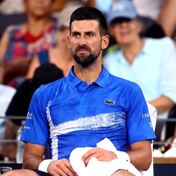 Serbia's Novak Djokovic looks on during his match against USA's Reilly Opelka at the Brisbane International, in Brisbane, Australia, Friday, Jan. 3, 2025. (AP Photo/Pat Hoelscher)