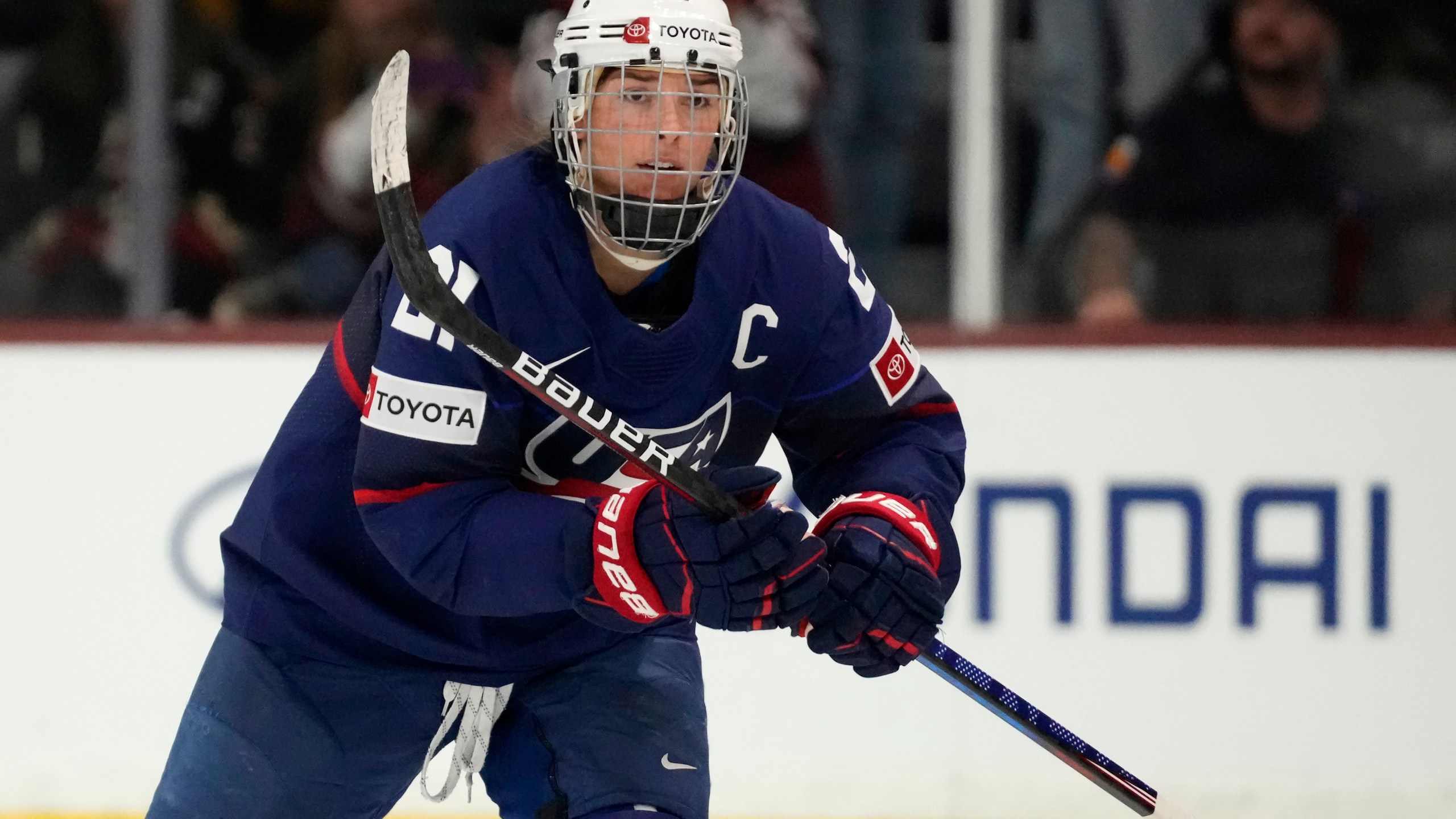 FILE - United States forward Hilary Knight skates to the bench to celebrate her goal against Canada during the first period of a rivalry series women's hockey game, Nov. 8, 2023, in Tempe, Ariz. (AP Photo/Ross D. Franklin, File)