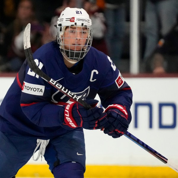 FILE - United States forward Hilary Knight skates to the bench to celebrate her goal against Canada during the first period of a rivalry series women's hockey game, Nov. 8, 2023, in Tempe, Ariz. (AP Photo/Ross D. Franklin, File)