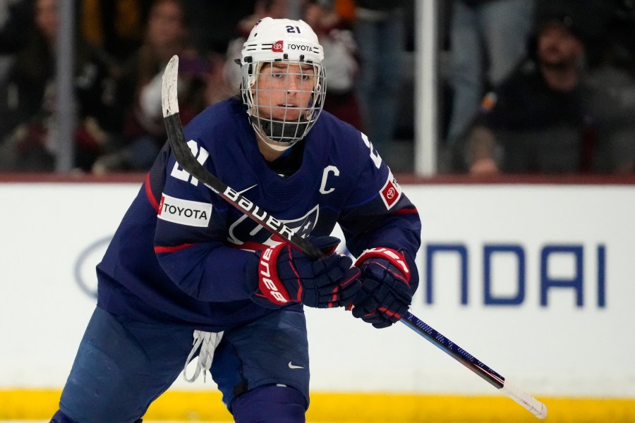 FILE - United States forward Hilary Knight skates to the bench to celebrate her goal against Canada during the first period of a rivalry series women's hockey game, Nov. 8, 2023, in Tempe, Ariz. (AP Photo/Ross D. Franklin, File)