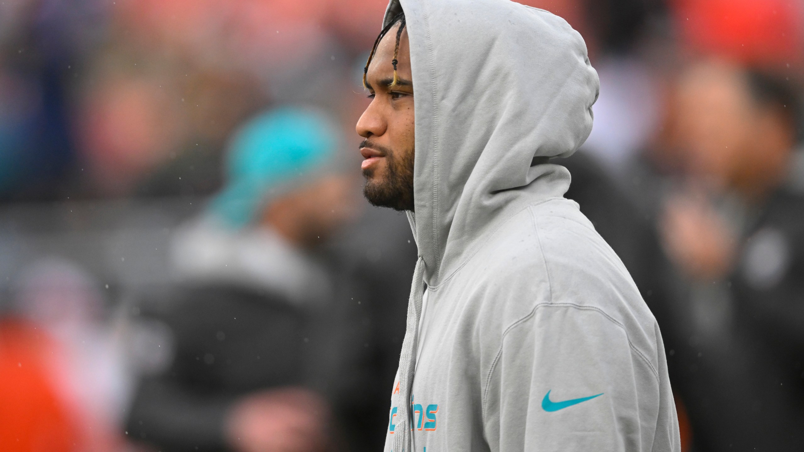 Miami Dolphins quarterback Tua Tagovailoa stands on the field before an NFL football game against the Cleveland Browns Sunday, Dec. 29, 2024, in Cleveland. (AP Photo/David Richard)