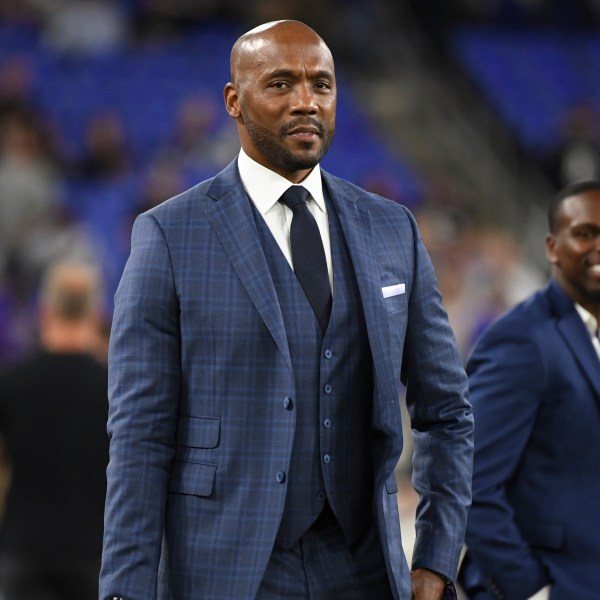 FILE - ESPN's Monday Night Football analyst Louis Riddick walks on the field during pre-game warm-ups before an NFL football game between the Baltimore Ravens and the Indianapolis Colts, on Oct. 11, 2021, in Baltimore, Md. (AP Photo/Terrance Williams, File)