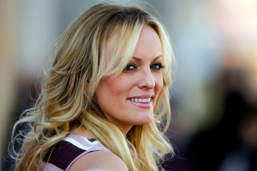 FILE — Adult film actress Stormy Daniels attends the opening of the adult entertainment fair "Venus," in Berlin, Oct. 11, 2018. (AP Photo/Markus Schreiber, File)