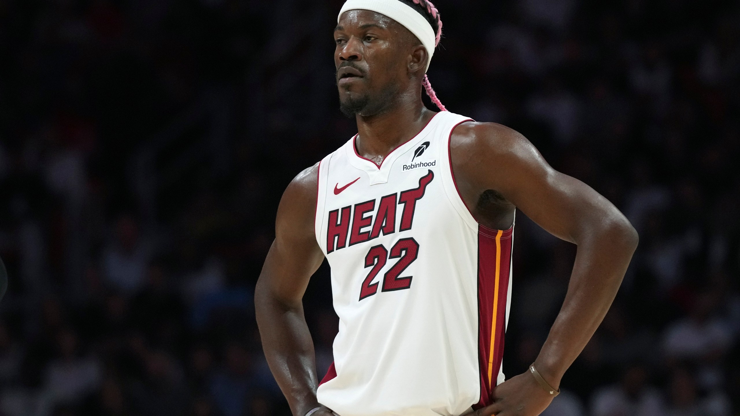 Miami Heat forward Jimmy Butler (22) stands on the court during the second half of an NBA basketball game against the New Orleans Pelicans, Wednesday, Jan. 1, 2025, in Miami. (AP Photo/Lynne Sladky)