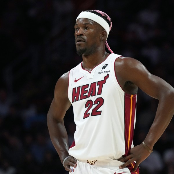 Miami Heat forward Jimmy Butler (22) stands on the court during the second half of an NBA basketball game against the New Orleans Pelicans, Wednesday, Jan. 1, 2025, in Miami. (AP Photo/Lynne Sladky)