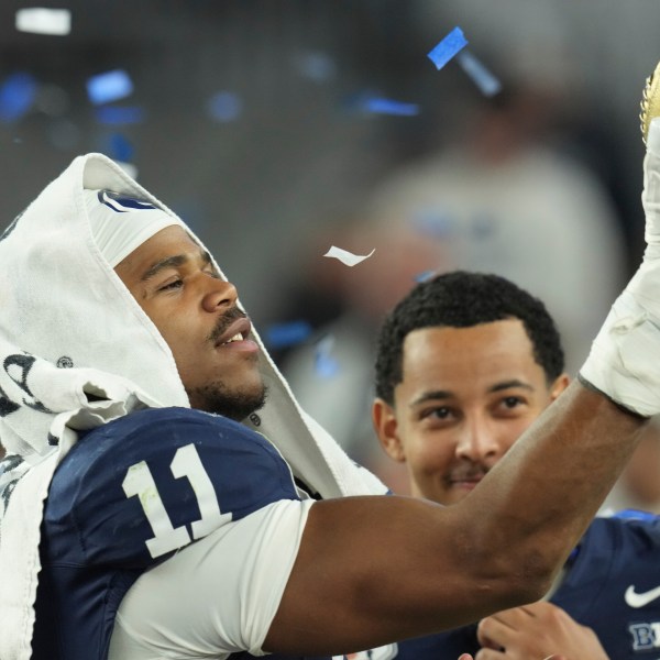 Penn State defensive end Abdul Carter (11) celebrates after the Fiesta Bowl College Football Playoff game against Boise State, Tuesday, Dec. 31, 2024, in Glendale, Ariz. (AP Photo/Ross D. Franklin)