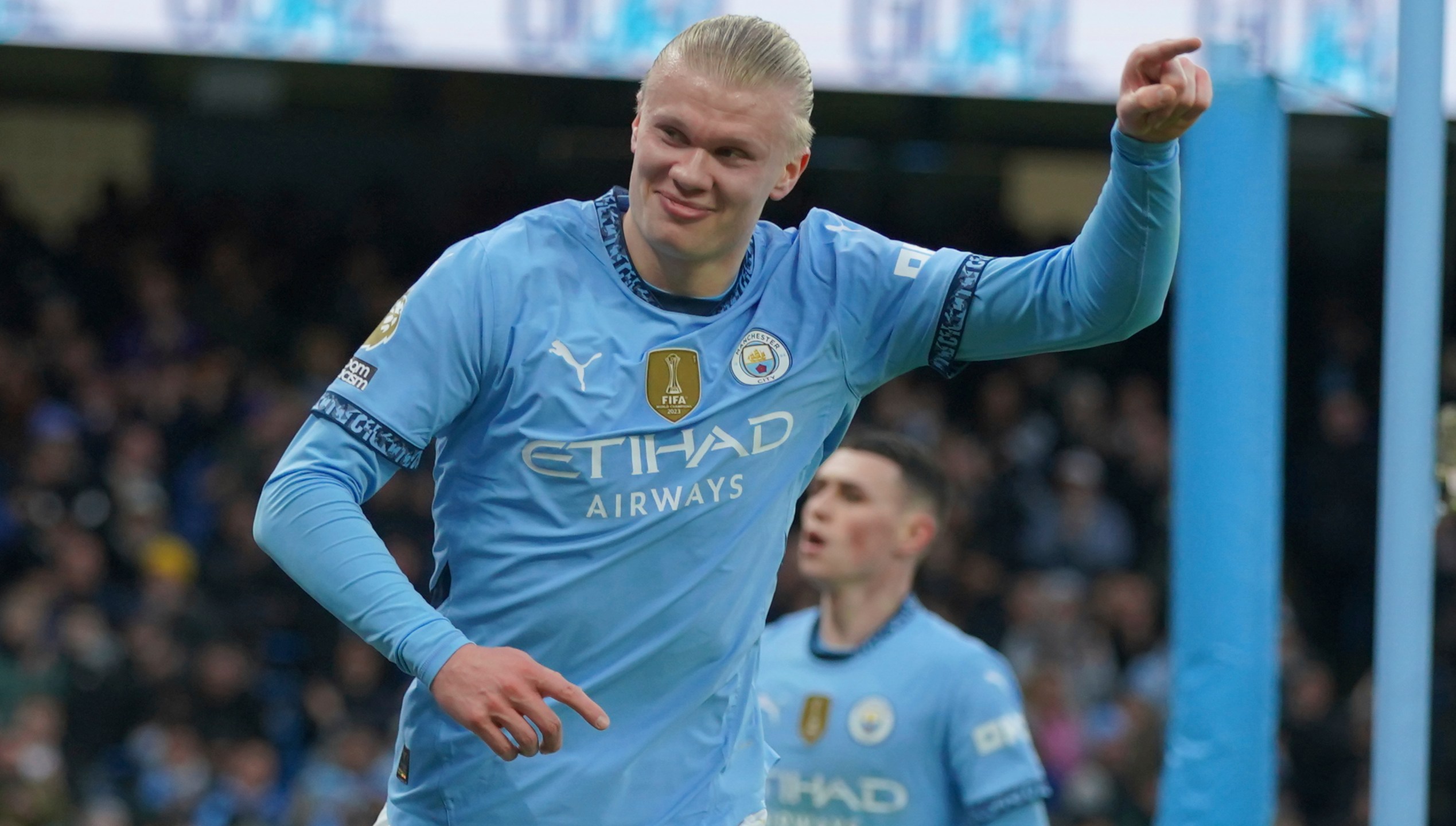 Manchester City's Erling Haaland celebrates after scoring his side's 2nd goal against West Ham during a English Premier League soccer match at Etihad stadium in Manchester, England, Saturday, Jan. 4, 2025. (AP Photo/Ian Hodgson)