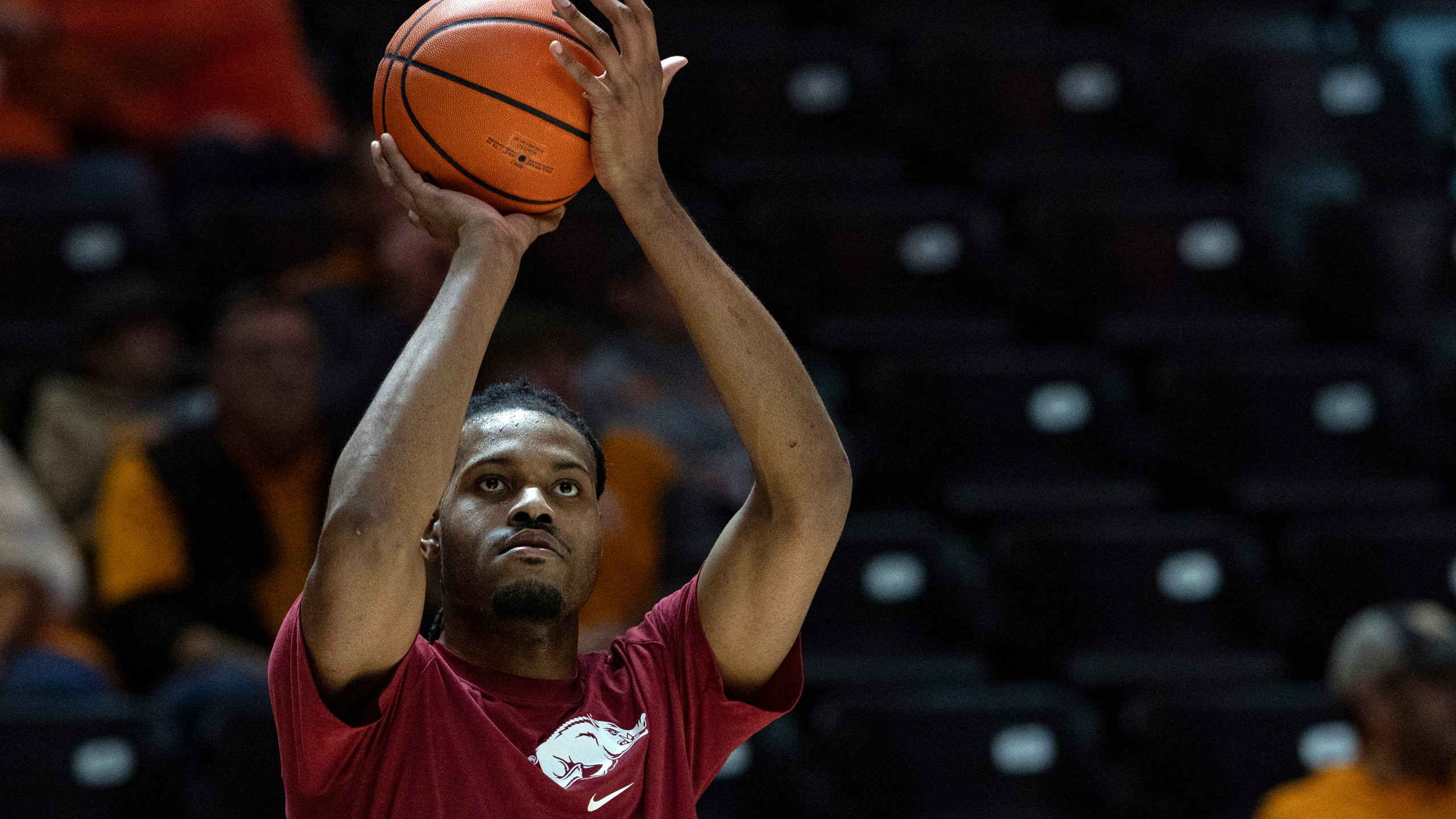 Former Tennessee player and current Arkansas forward Jonas Aidoo (9) shoots during warmups before an NCAA college basketball game against Tennessee, Saturday, Jan. 4, 2025, in Knoxville, Tenn. (AP Photo/Wade Payne)