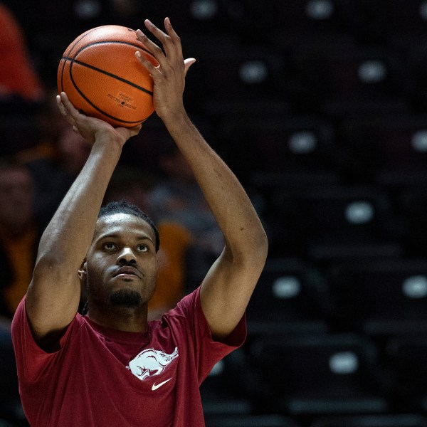 Former Tennessee player and current Arkansas forward Jonas Aidoo (9) shoots during warmups before an NCAA college basketball game against Tennessee, Saturday, Jan. 4, 2025, in Knoxville, Tenn. (AP Photo/Wade Payne)