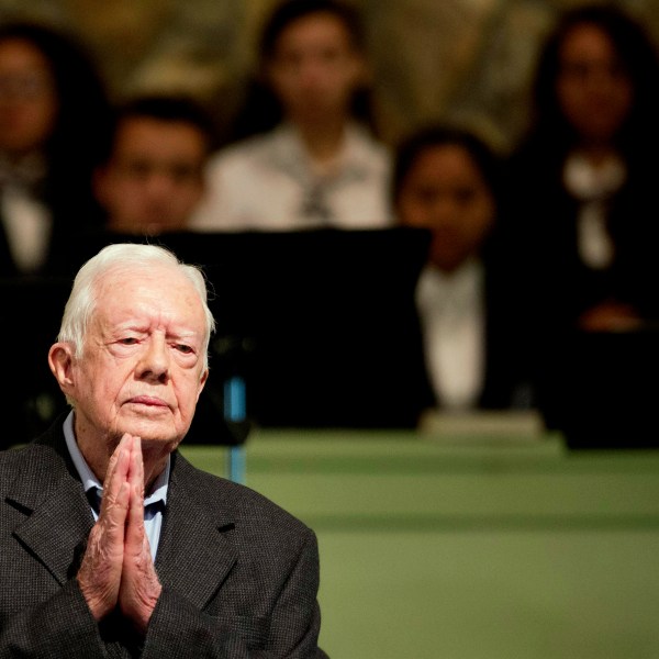 FILE - Former President Jimmy Carter teaches Sunday school class at Maranatha Baptist Church in his hometown, Aug. 23, 2015, in Plains, Ga. The 90-year-old Carter gave one lesson to about 300 people filling the small Baptist church that he and his wife, Rosalynn, attend. It was Carter's first lesson since detailing the intravenous drug doses and radiation treatment planned to treat melanoma found in his brain after surgery to remove a tumor from his liver. (AP Photo/David Goldman, File)