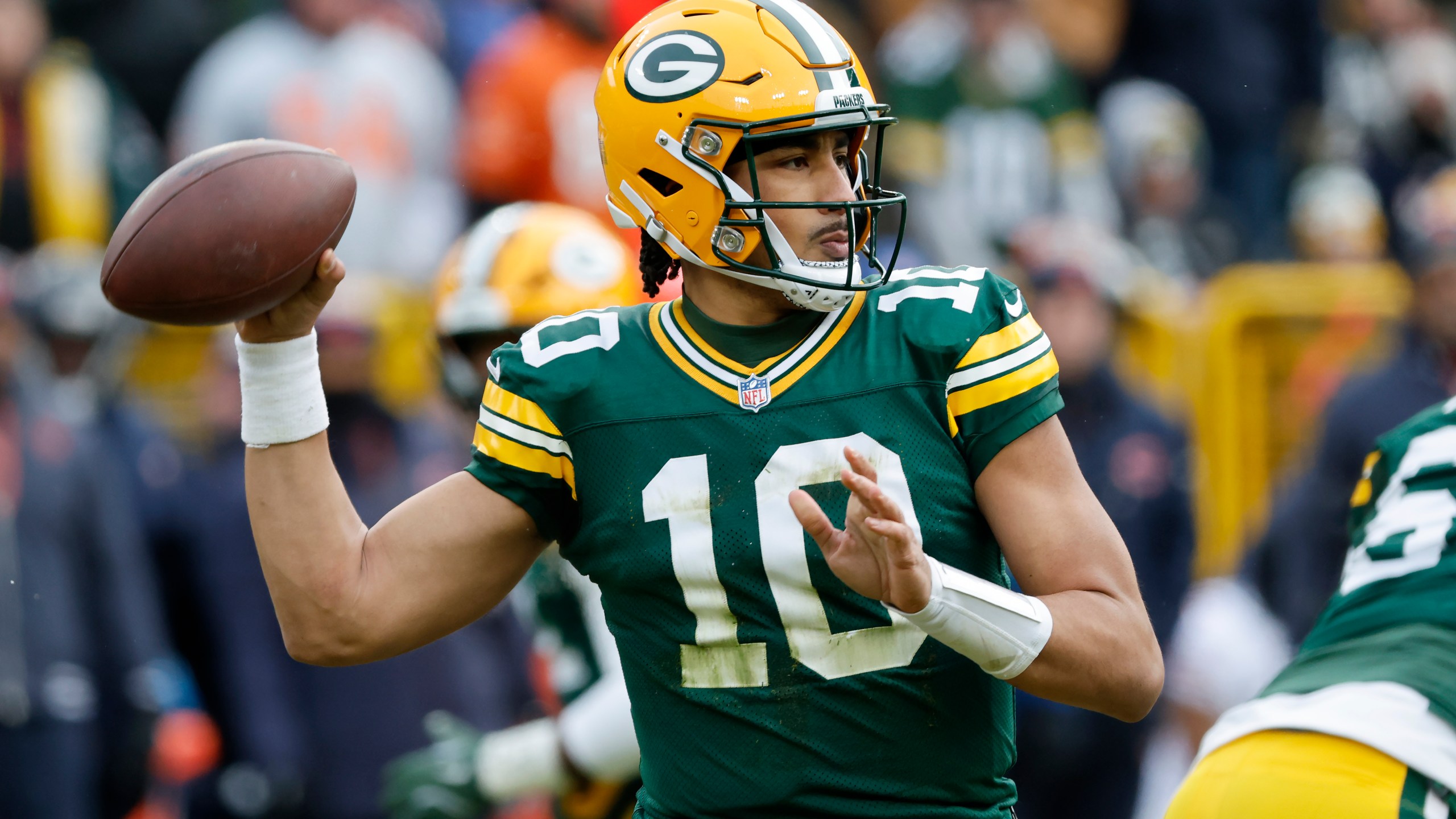 Green Bay Packers quarterback Jordan Love (10) passes against the Chicago Bears during the first half of an NFL football game, Sunday, Jan. 5, 2025, in Green Bay, Wis. (AP Photo/Mike Roemer)