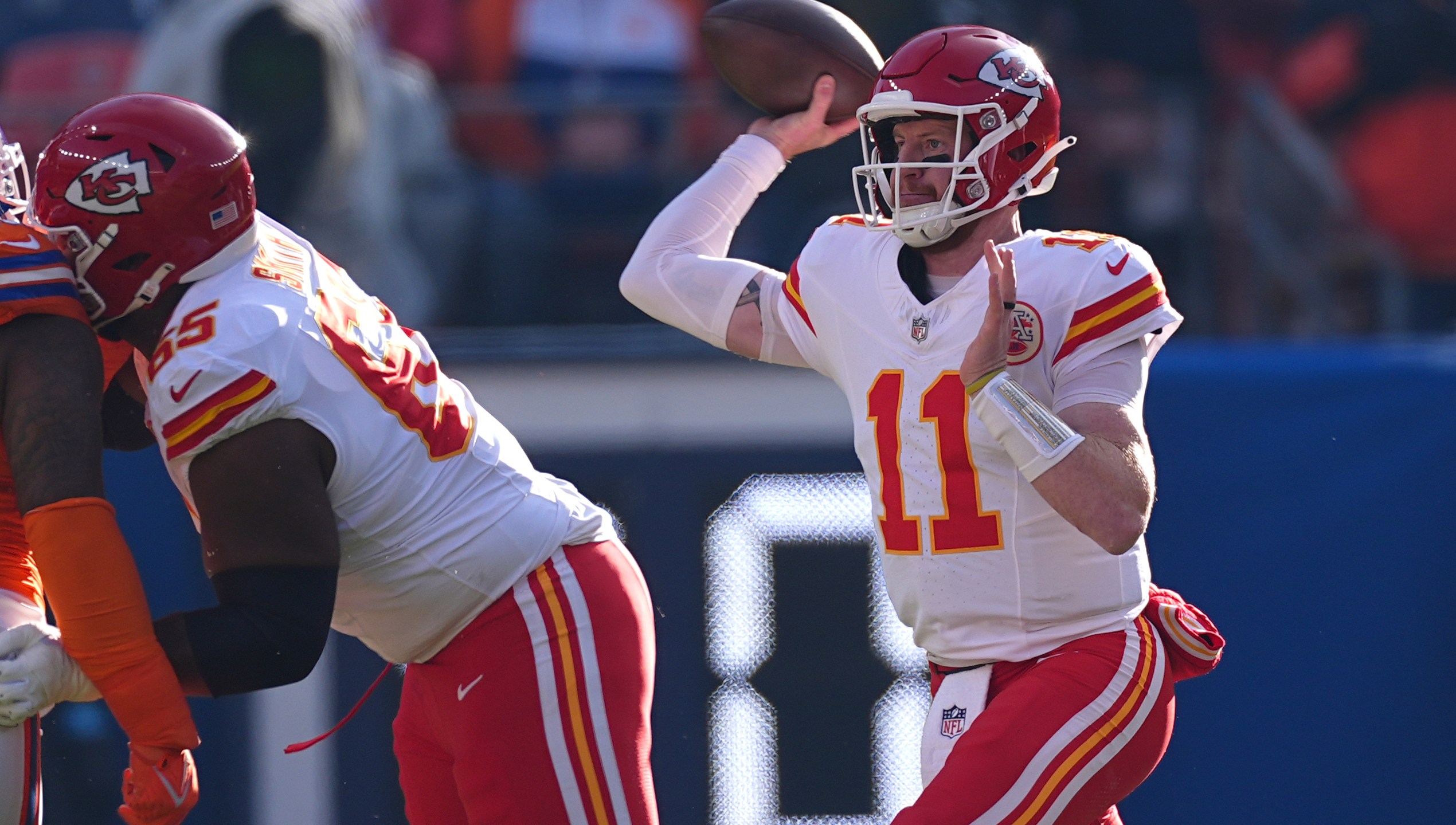 Kansas City Chiefs quarterback Carson Wentz throws during the first half of an NFL football game against the Denver Broncos Sunday, Jan. 5, 2025, in Denver. (AP Photo/David Zalubowski)