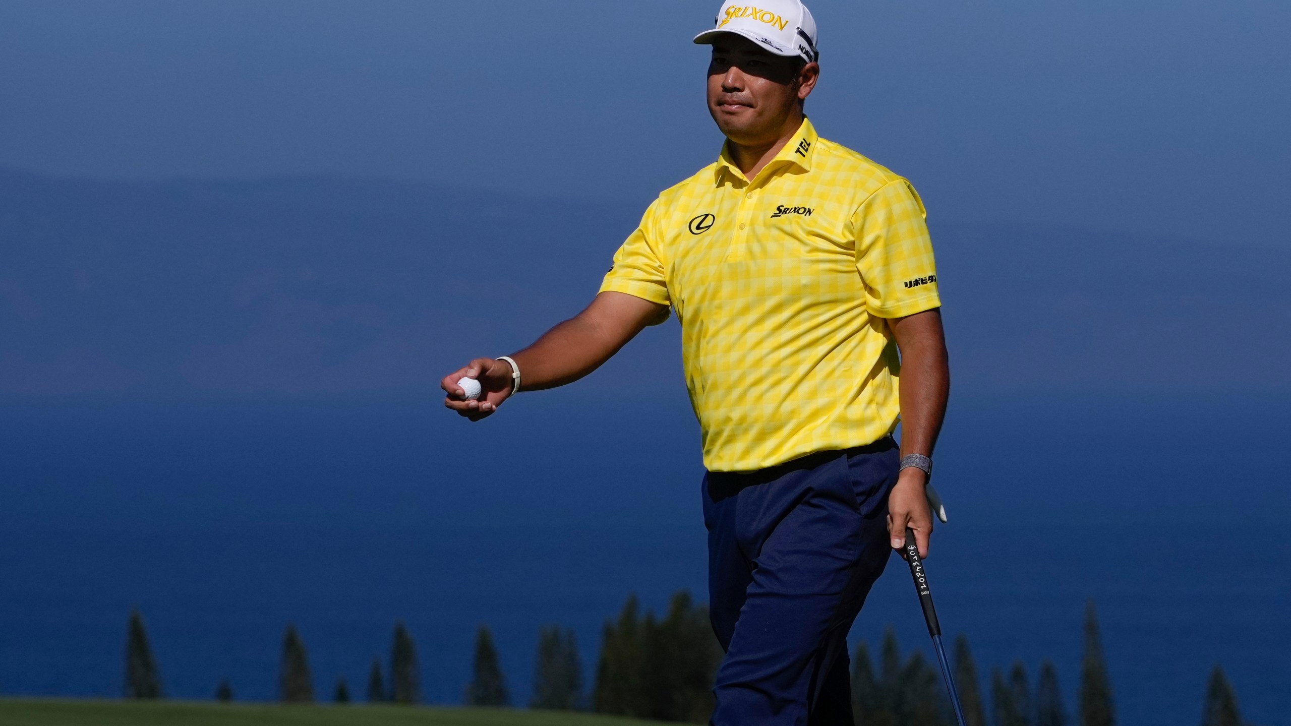 Hideki Matsuyama, of Japan, reacts after missing birdie on the fourth green during the final round of The Sentry golf event, Sunday, Jan. 5, 2025, at Kapalua Plantation Course in Kapalua, Hawaii. (AP Photo/Matt York)