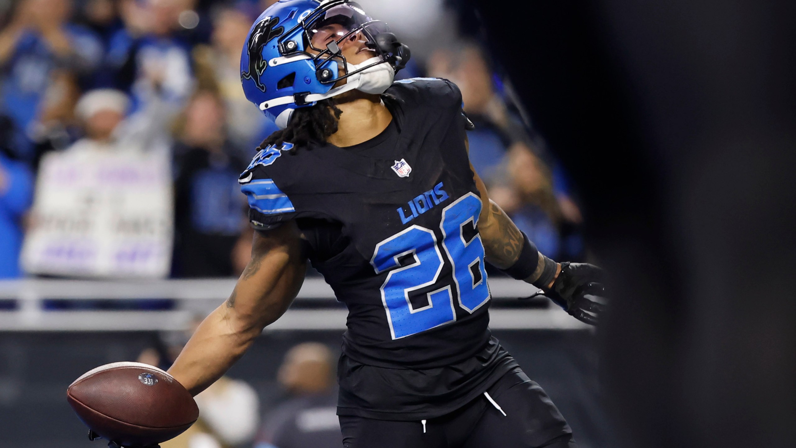 Detroit Lions running back Jahmyr Gibbs (26) celebrates his touchdown catch against the Minnesota Vikings during the second half of an NFL football game Sunday, Jan. 5, 2025, in Detroit. (AP Photo/Rey Del Rio)