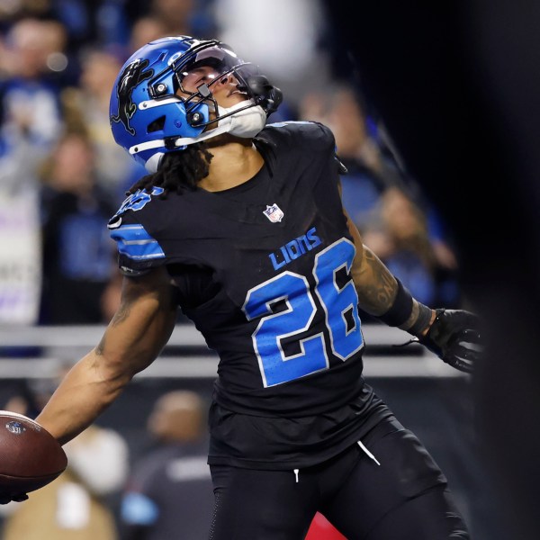 Detroit Lions running back Jahmyr Gibbs (26) celebrates his touchdown catch against the Minnesota Vikings during the second half of an NFL football game Sunday, Jan. 5, 2025, in Detroit. (AP Photo/Rey Del Rio)