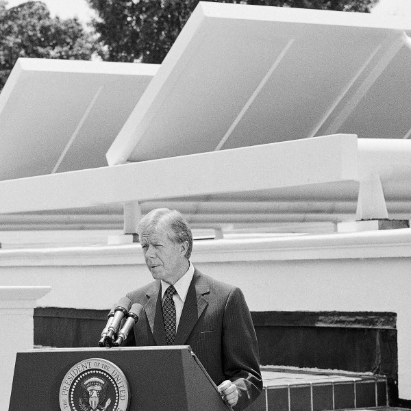 FILE - President Jimmy Carter speaks against a backdrop of solar panels at the White House, June 21, 1979, in Washington. (AP Photo/Harvey Georges, File)