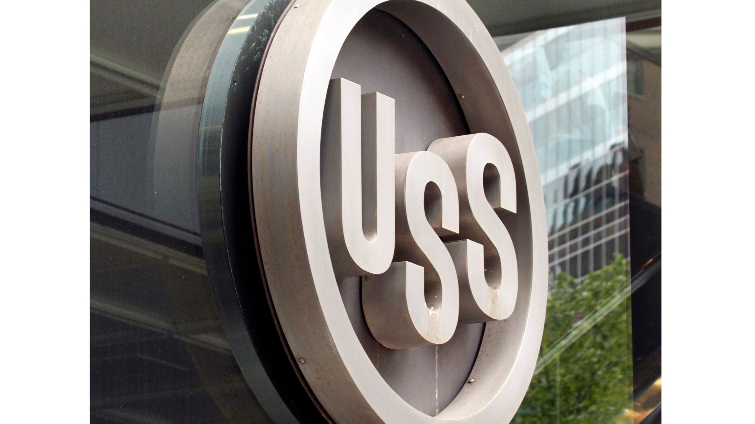 FILE - This April 26, 2010, file photo shows the United States Steel logo outside the headquarters building in downtown Pittsburgh. (AP Photo/Gene J. Puskar, File)