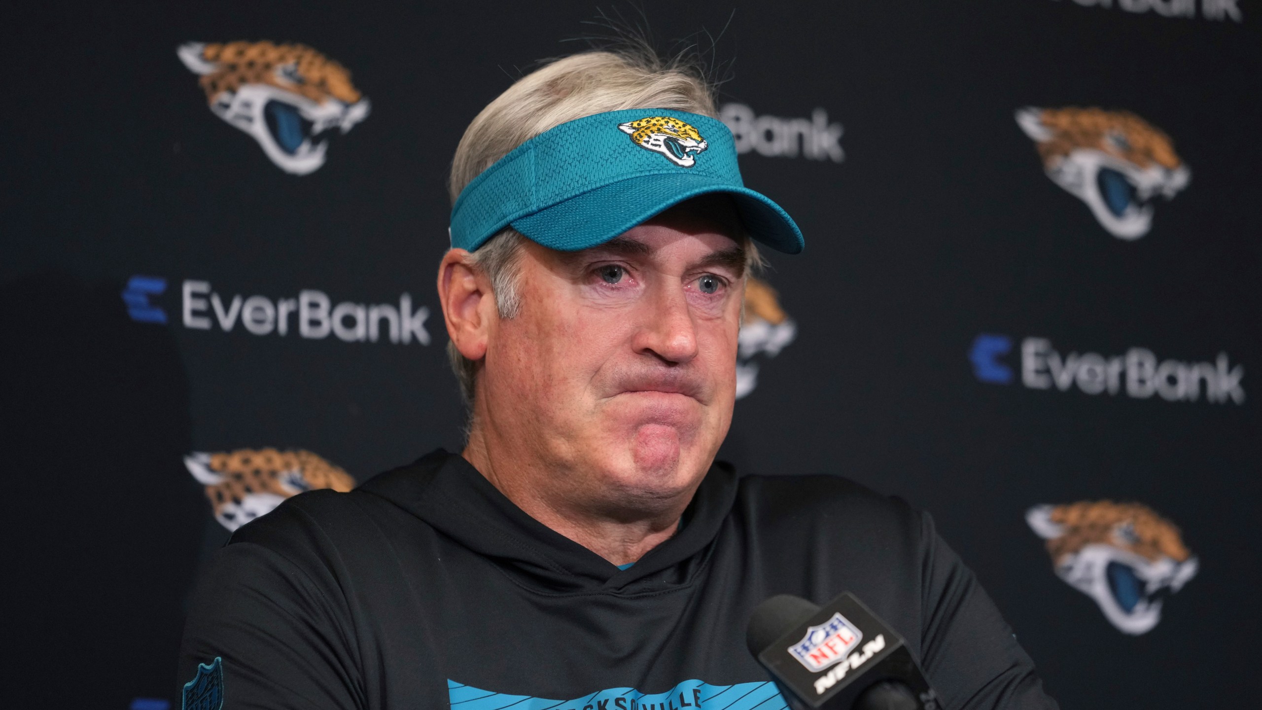 Jacksonville Jaguars head coach Doug Pederson pauses during a news conference after an NFL football game against the Indianapolis Colts, Sunday, Jan. 5, 2025, in Indianapolis. The Colts won 26-23 in overtime. (AP Photo/Michael Conroy)