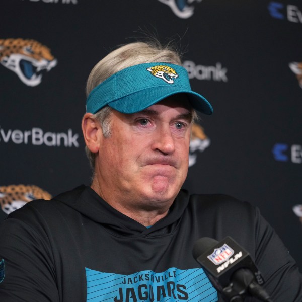 Jacksonville Jaguars head coach Doug Pederson pauses during a news conference after an NFL football game against the Indianapolis Colts, Sunday, Jan. 5, 2025, in Indianapolis. The Colts won 26-23 in overtime. (AP Photo/Michael Conroy)