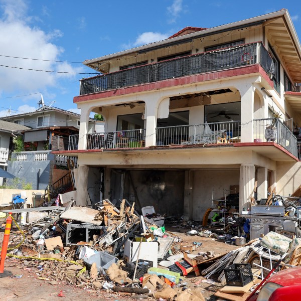 A view of the home where a New Year's Eve fireworks explosion killed and injured people, Wednesday, Jan. 1, 2025, in Honolulu. (AP Photo/Marco Garcia)