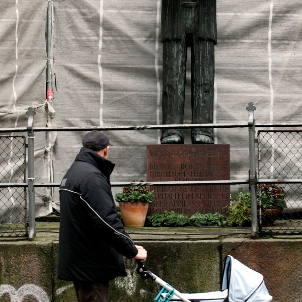 FILE - A statue of former German pastor Dietrich Bonhoeffer (made by Fritz Fleer) stands outside St. Petri church in downtown Hamburg, northern Germany, Feb. 3, 2006. Bonhoeffer was hanged by the Nazis in the concentration camp Flossenbuerg on April 9, 1944. (AP Photo/Fabian Bimmer, File)