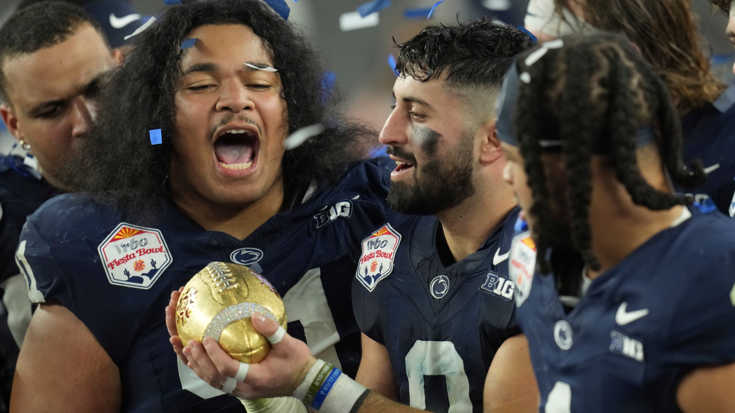 Penn State players celebrate after the Fiesta Bowl College Football Playoff game against Boise State, Tuesday, Dec. 31, 2024, in Glendale, Ariz. (AP Photo/Ross D. Franklin)