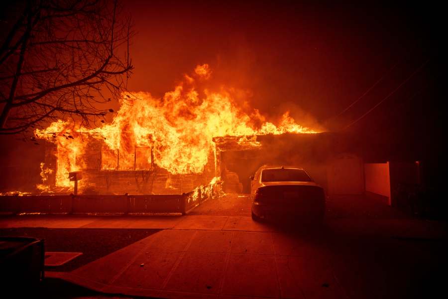 A structure is burned by the Palisades Fire in the Pacific Palisades neighborhood of Los Angeles, Tuesday, Jan. 7, 2025. (AP Photo/Ethan Swope)