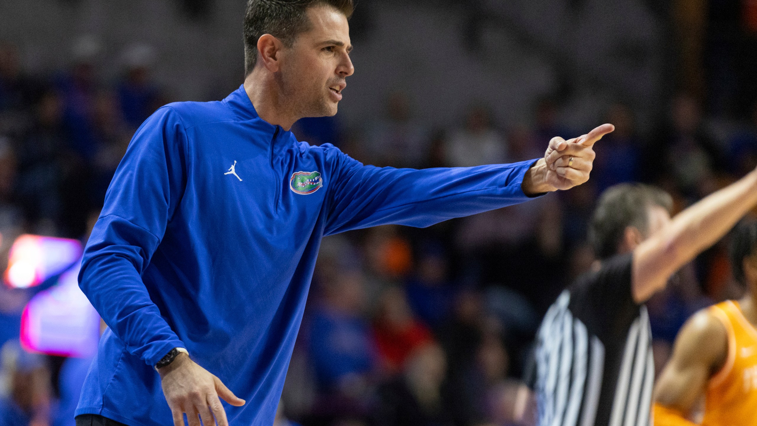 Florida head coach Todd Golden reacts during the first half of an NCAA college basketball game against Tennessee, Tuesday, Jan. 7, 2025, in Gainesville, Fla. (AP Photo/Alan Youngblood)