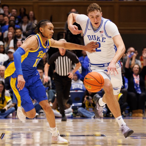 Duke's Cooper Flagg (2) gathers a loose ball for a fast break ahead of Pittsburgh's Jaland Love (15) during the second half of an NCAA college basketball game in Durham, N.C., Tuesday, Jan. 7, 2025. (AP Photo/Ben McKeown)