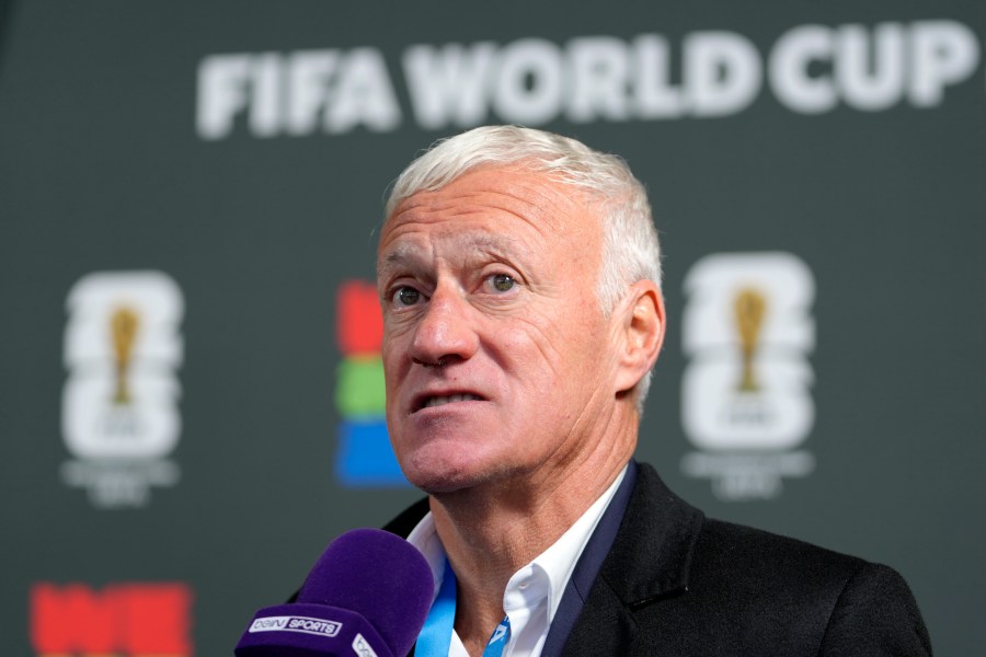 France head coach Didier Deschamps talks to the media after the UEFA Preliminary Draw for the 2026 FIFA World Cup at FIFA headquarters in Zurich, Switzerland, Friday, December 13, 2024. (AP Photo/Martin Meissner)